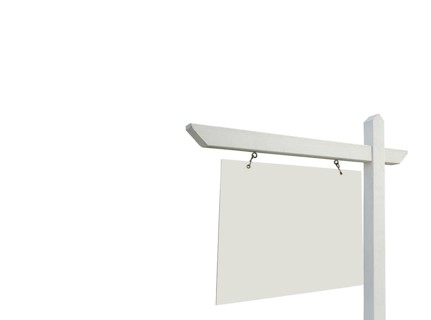 Blank real estate sign isolated on a white background
