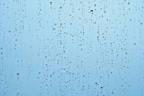 Rain water drops droplets on window glass texture background