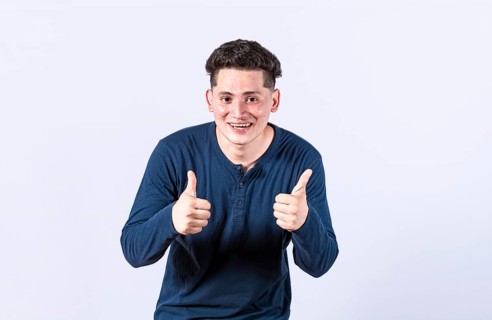 Positive guy with thumbs up doing ok