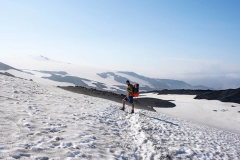 Hiker on snow field