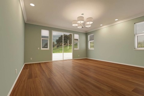 Newly remodeled room of house with finished wood floors