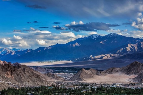 View of Leh town from above from Shanti Stupa on sunset