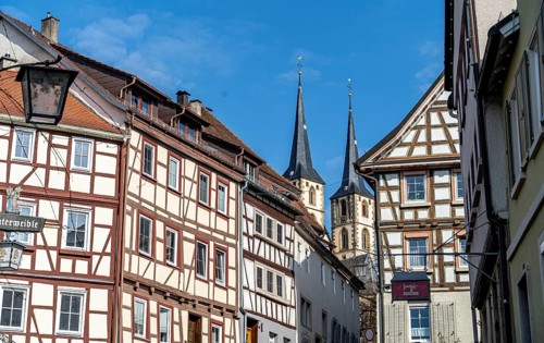 Old historic half-timbered houses in an alley in the imperial palace of Bad Wimpfen