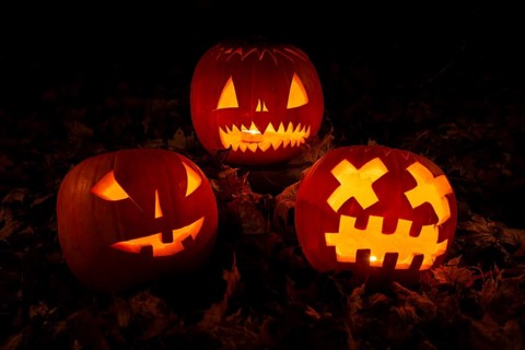 Glowing pumpkins at night