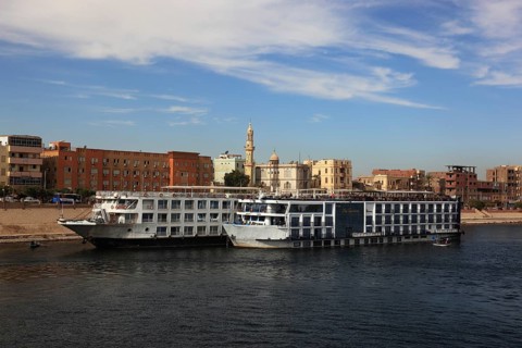 Cruise ships at the landing stage on the Nile near the town of Esna