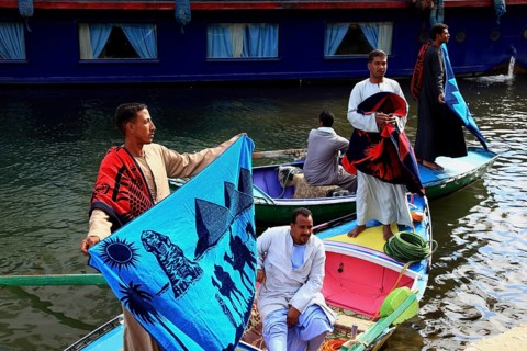 Souvenir seller with a rowing boat on the Nile