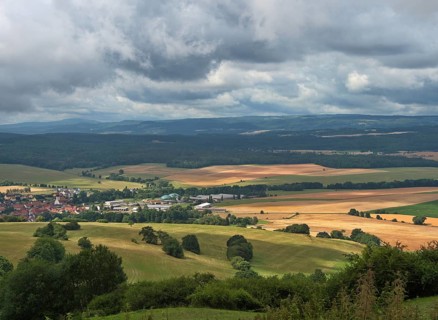 View from the Dr. Malade Memorial Stone onto the plain in front of Geba in the UNESCO Biosphere Reserve Rhoen