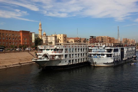 Cruise ships at the landing stage on the Nile near the town of Esna