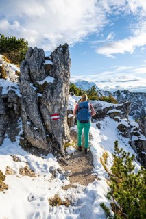 Young female hiker on hiking trail to Kramerspitz