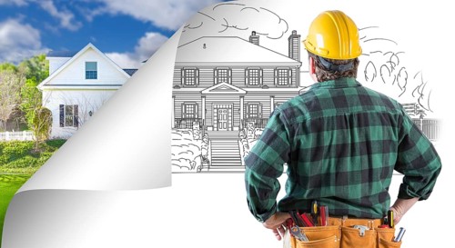 Contractor facing house drawing with page corner flipping to photo behind