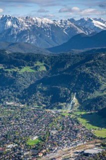 View over Garmisch-Partenkirchen with ski jump and Wetterstein Mountains