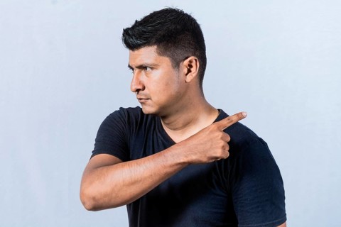 Angry person pointing to get out