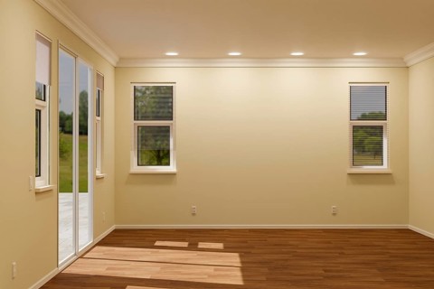 Newly remodeled room of house with finished wood floors