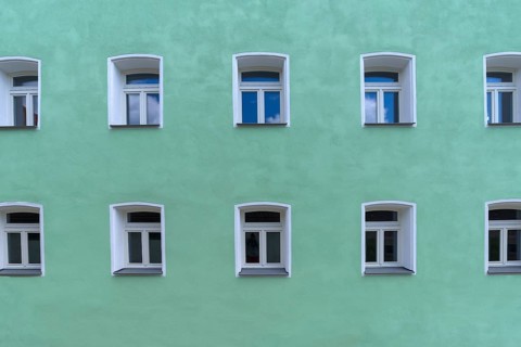 Turquoise facade with windows