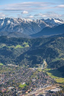 View over Garmisch-Partenkirchen with ski jump and Wetterstein Mountains
