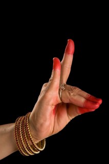 Woman hand showing Simhamukha hasta
