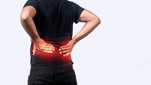 A sore man with back pain