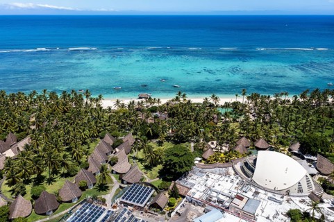Aerial view The beach of Flic en Flac with luxury hotel and palm trees