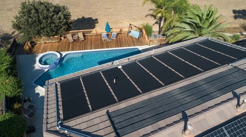Thermal solar panels installed on the roof of a large house