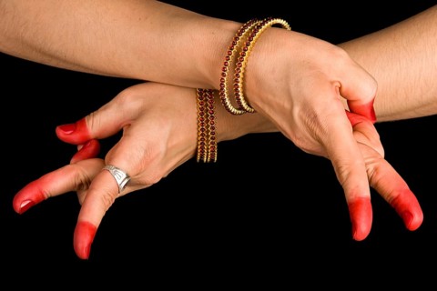 Woman hand showing Kartariswatika hasta of indian classic dance Bharata Natyam