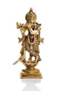 Krishna god Vishnu avatar brass statue isolated on white with reflection