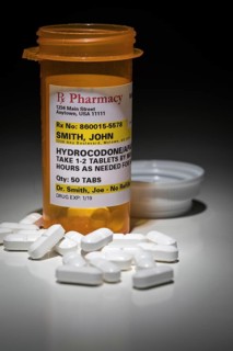 Hydrocodone pills and prescription bottle with non proprietary label. no model release required