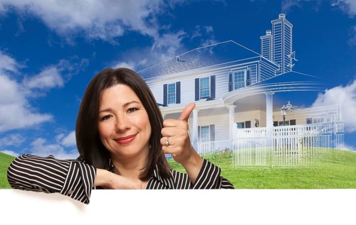 Thumbs up hispanic woman with ghosted house drawing