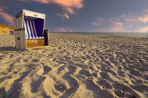 Beach chair on the main beach of Rantum in the evening
