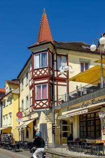 Facade with bay window and turret
