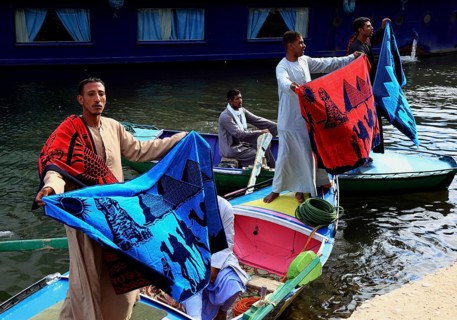 Souvenir seller with a rowing boat on the Nile