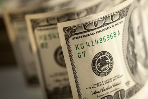 Abstract of one hundred dollar bills