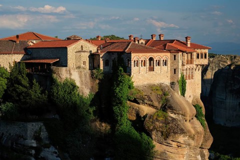 Monastery of Varlaam monastery in famous greek tourist destination Meteora in Greece on sunset with scenic scenery landscape