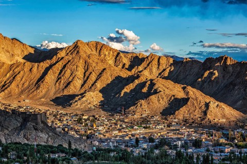 View of Leh town from above from Shanti Stupa on sunset. Ladakh