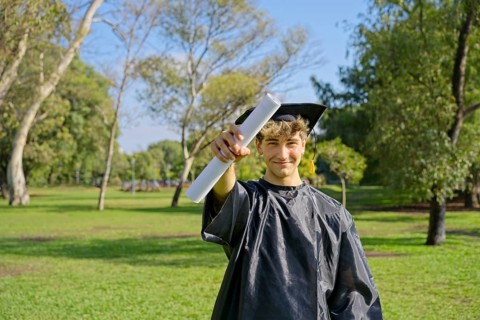 Young recent graduate boy