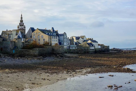Old town of Roscoff with church Notre-Dame-de-Croaz-Batz at low tide