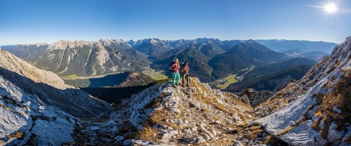 Two female hikers on a summit