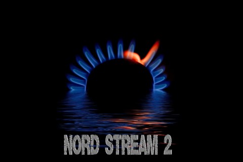 Blue gas flame reflected in the water