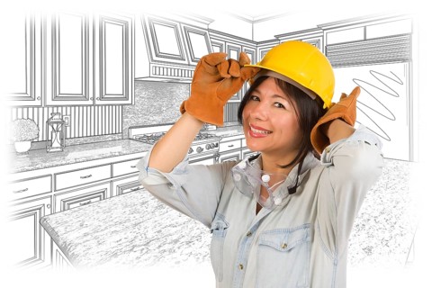 Pretty hispanic woman in hard hat and gloves with kitchen drawing behind