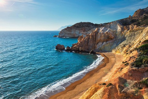 Agios Ioannis greek beach and Aegean sea on sunset