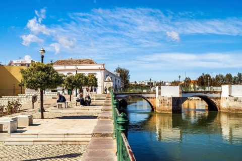 Beautiful cityscape of historic Tavira by Gilao river