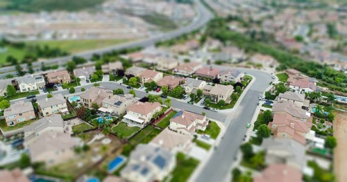 Aerial view of populated neigborhood of houses with tilt-shift blur