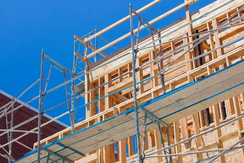 Scaffolding and wood framing at construction site