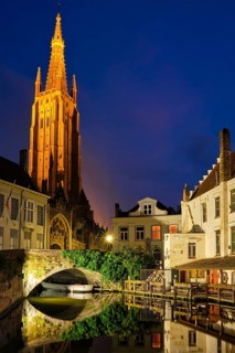 Church of Our Lady and canal illuminated in the night