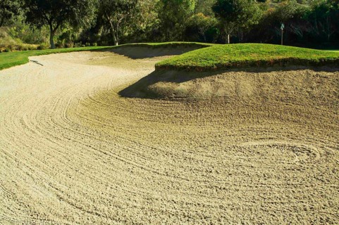 Abstract of golf course and sand bunker