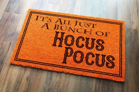 It's all A bunch of hocus pocus halloween orange welcome mat on wood floor background