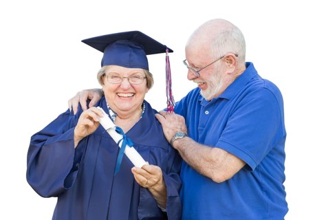 Senior woman and graduate in hat and gown being congratulated by husband isolated on white