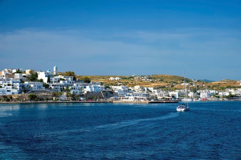 Yacht boat in Aegean sea near Adamantas Adamas harbor town of Milos island. Milos