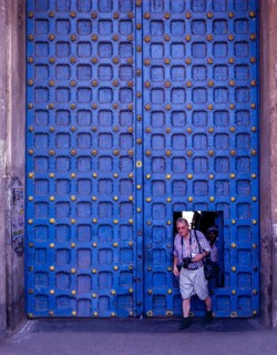 A tourist crossing the Main door in Varadarajaswamy temple