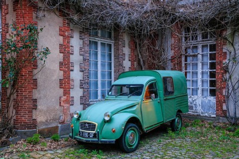 Vintage Citroen 2CV duck in a courtyard