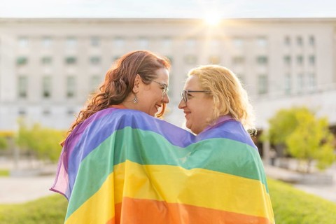 Lesbian women couple in love embracing each other